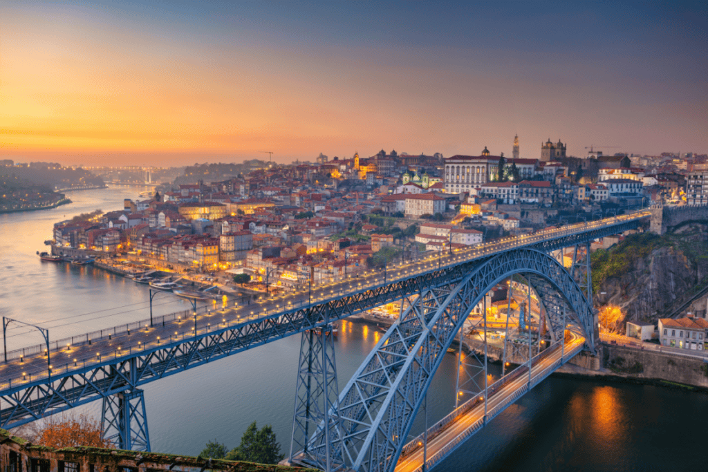 The Dom LuÃs I Bridge and the historic Ribeira waterfront in Porto, Portugal.