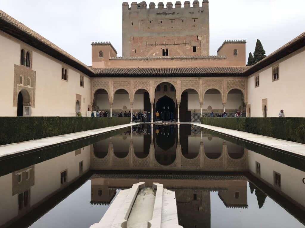Courtyard with reflecting pool at Alhambra in Granada Spain.