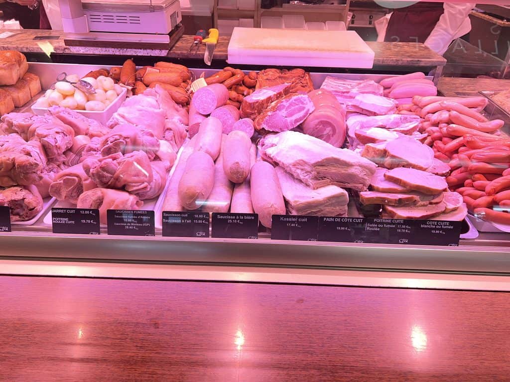 Butcher stall inside Les Halles de Paul Bocuse